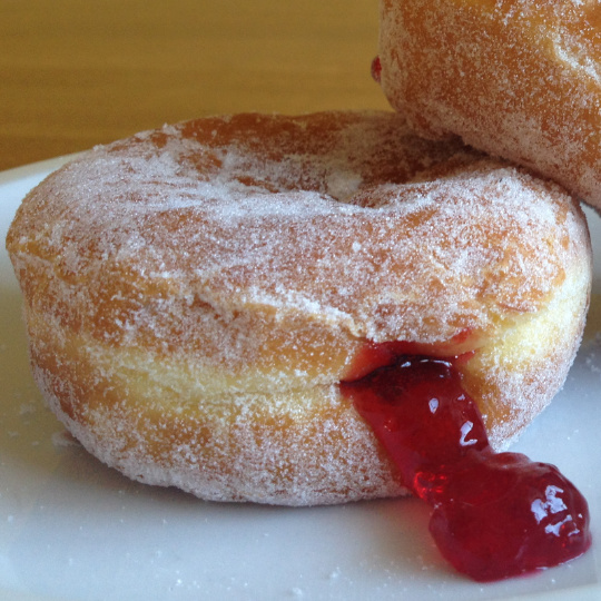 leakingdoughnut540 - Brisbane Back Pain Program | McGill Certified Practitioner | Online Coaching A squashed jam doughnut with jam leaking out of the rear.